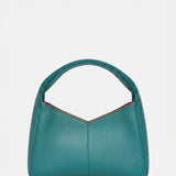Teal handbag on a white background