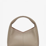 Beige handbag on a white background