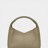 Green handbag on a white background